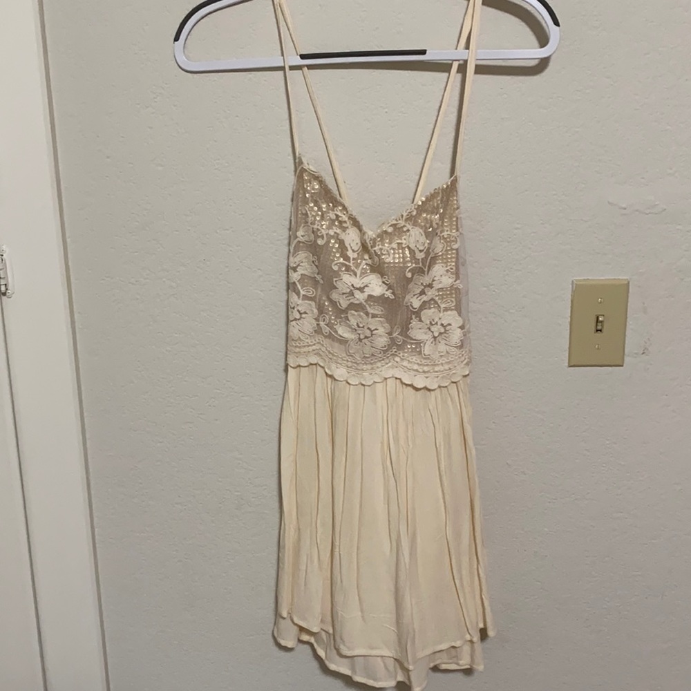 Gold and cream dress. Crisscross back